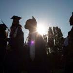 Rainier Beach graduation students in sillouette
